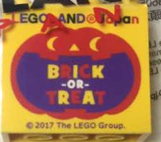 Lego Brick 2 x 4 x 3 with LEGOLAND Japan, 'BRICK-OR-TREAT', and Red Jack O Lantern with Dark Purple Mouth Pattern / Yellow