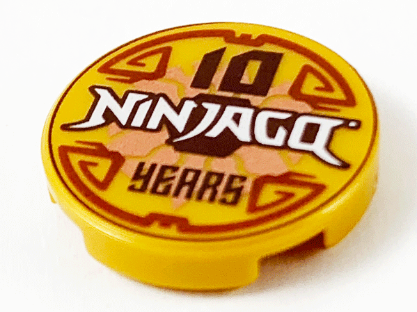 Lego Tile, Round 2 x 2 with Bottom Stud Holder with '10 NINJAGO YEARS' Pattern