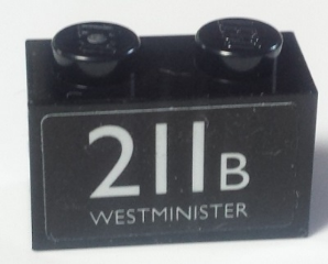 Lego Brick 1 x 2 with White '211B WESTMINISTER' Pattern (Sticker) - Set 40220 / Black