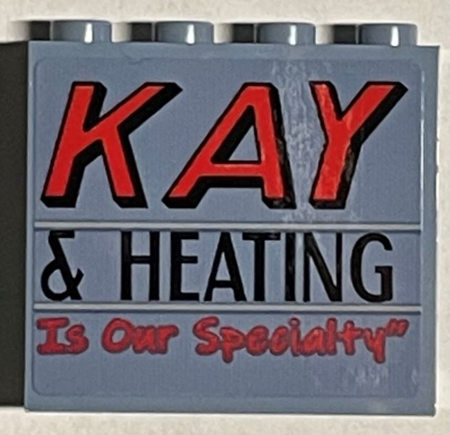 Lego Panel 1 x 4 x 3 with Side Supports - Hollow Studs with 'KAY, '& HEATING' and 'Is Our Specialty' Pattern Model Front Right Side (Sticker) - Set 21330 / Sand Blue