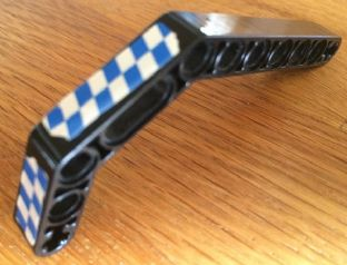 Lego Technic, Liftarm, Modified Bent Thick 1 x 11.5 Double with Blue and White Checkered Pattern Model Right Side (Stickers) - Set 8163 / Black