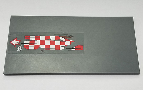 Lego Tile 8 x 16 with Bottom Tubes, Textured Surface with Red and White Tattered Checkered Flag, Arrow and Dirt Pattern (Sticker) - Set 70605