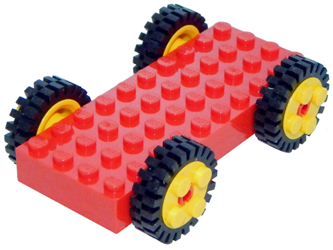 Lego Brick, Modified 4 x 10 with 4 Pins with 4 Yellow Wheel FreeStyle with Technic Pin Hole and 4 Black Tire 24mm D. x 8mm Offset Tread - Interior Ridges (30076 / 6248 / 3483)