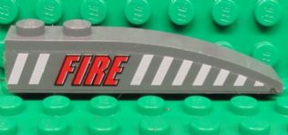 Lego Slope, Curved 6 x 1 with 2 Studs with Red 'FIRE' and White Stripes Pattern Model Left Side (Sticker) - Set 7043 / Dark Bluish Gray