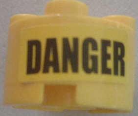 Lego Brick, Round 2 x 2 with Axle Hole with Black 'DANGER' Pattern (Sticker) - Set 7787 / Yellow