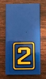 Lego Tile 2 x 4 with Yellow Number '2' on Blue Background Pattern (Sticker) - Set 21311