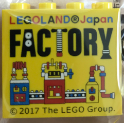 Lego Brick 2 x 4 x 3 with LEGOLAND Japan, Black 'FACTORY', and Blue, Red, and White Machine Pattern