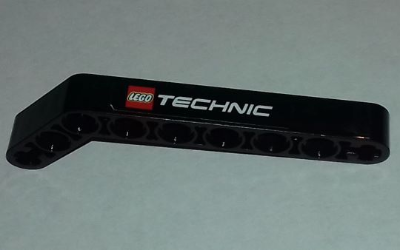 Lego Technic, Liftarm, Modified Bent Thick 1 x 9 (7 - 3) with LEGO TECHNIC Logo Pattern Model Left Side (Sticker) - Sets 9395 / 9398 / Black