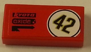 Lego Tile 1 x 2 with Black '42' in White Circle, 'Kyoto' and 'Oxide' on Red Background Pattern Model Left Side (Sticker) - Set 8147