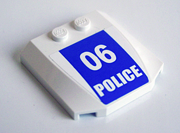 Lego Wedge 4 x 4 x 2/3 Triple Curved with White '06 POLICE' on Blue Background Pattern (Sticker) - Set 3661