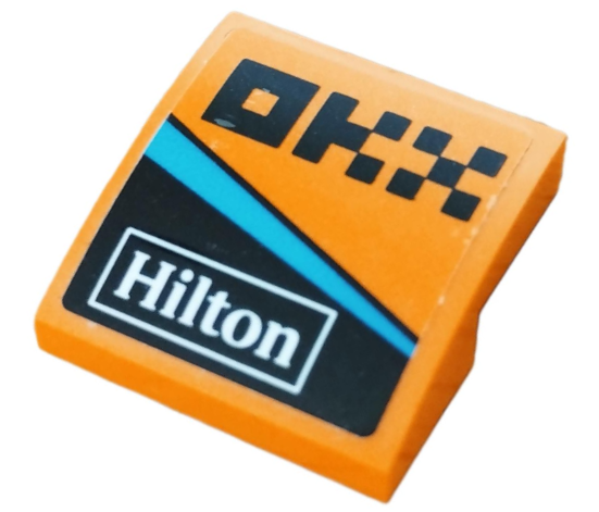 Lego Slope, Curved 2 x 2 with Black Pixelated 'OKX', White 'Hilton' and Dark Azure Stripe Pattern Model Right Side (Sticker) - Set 76919