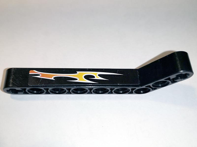 Lego Technic, Liftarm, Modified Bent Thick 1 x 9 (7 - 3) with Orange Flames Pattern Right Side A (Sticker) - Set 8167 / Black
