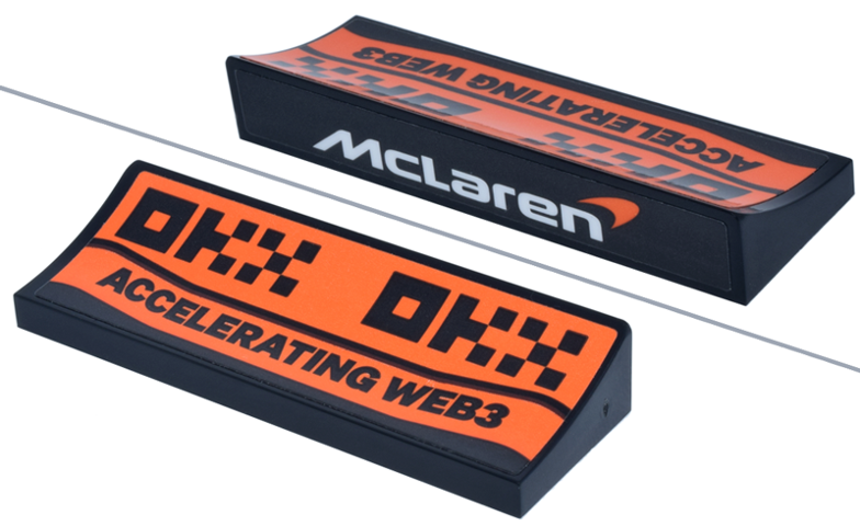 Lego Arch 6 x 2 x 5/6 Inverted with 'DKX DKX' 'ACCELERATING WEB3' on Orange Background and White 'McLaren' Logo Pattern (Stickers) - Set 77251 / Black