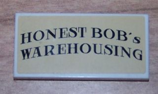 Lego Tile 2 x 4 with 'HONEST BOB's WAREHOUSING' on Tan Background Pattern (Sticker) - Set 8199