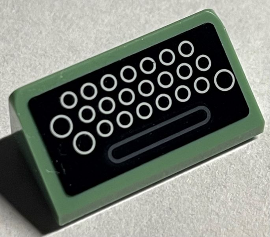 Lego Slope 30 1 x 2 x 2/3 with Typewriter, White Circles on Black Background Pattern (Sticker) - Set 76403 / Sand Green