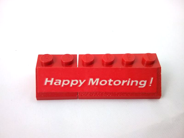 Lego Stickered Assembly 6 x 2 x 1 with 'Happy Motoring !' Pattern Model Right Side (Sticker) - Set  554