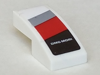 Lego Slope, Curved 2 x 1 x 2/3 with 'DMG MORI' on Light Bluish Gray, Red and Black Diagonal Stripes Pattern Model Right Side (Sticker) - Set 75887