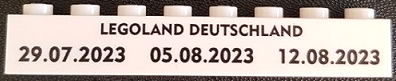 Lego Brick 1 x 8 with 'LEGOLAND DEUTSCHLAND 29.07.2023 05.08.2023 12.08.2023' Pattern / White