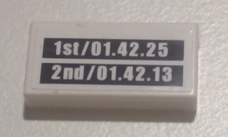 Lego Tile 1 x 2 with Lap Times '1st/01.42.25' and '2nd/01.42.13' Pattern (Sticker) - Set 8673 / White