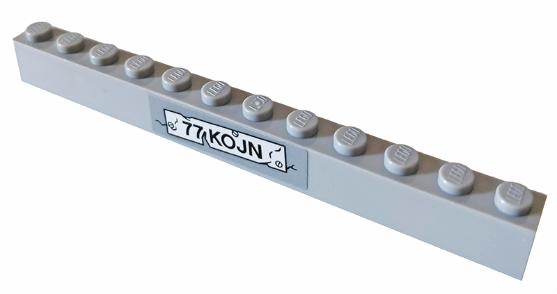 Lego Brick 1 x 12 with '77KOJN' Pattern (Sticker) - Set 76078 / Light Bluish Gray