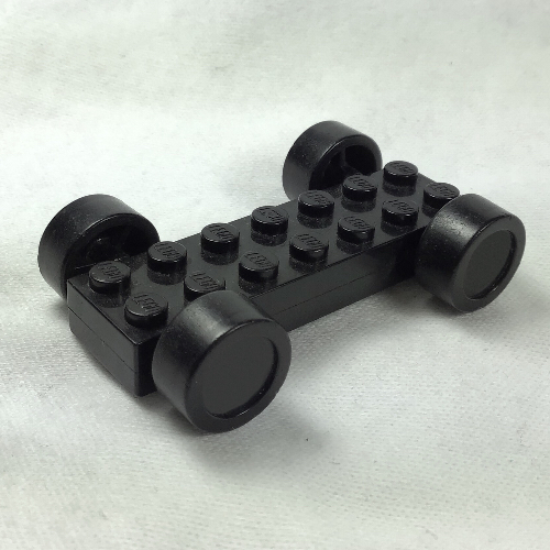 Lego Vehicle Base Fast Food Racer 2 x 7 x 2/3 with Black Wheels, Slicks / Black
