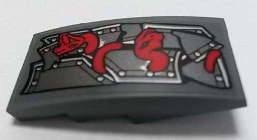 Lego Slope, Curved 4 x 2 with Metal Plates and Red Snakes Pattern Model Right Side (Sticker) - Set 70622