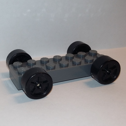 Lego Vehicle Base Fast Food Racer 2 x 7 x 2/3 with Black Spoked Wheels, Slicks / Dark Bluish Gray