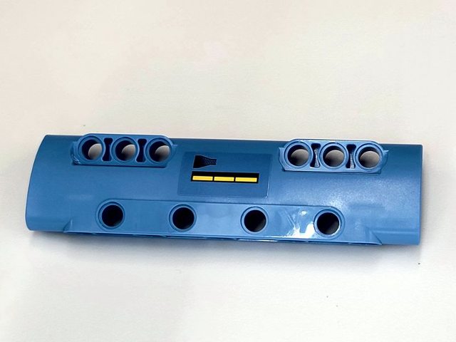 Lego Technic, Panel Curved 11 x 3 with 10 Pin Holes through Panel Surface with 3 Yellow Bars and Black Fade Pattern Side A (Sticker) - Set 42066 / Medium Blue