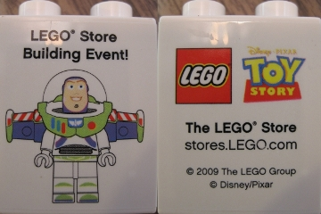 Lego Duplo, Brick 1 x 2 x 2 with LEGO Store Building Event Toy Story Buzz Lightyear 2009 Pattern