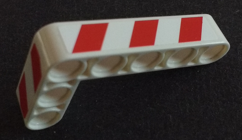 Lego Technic, Liftarm, Modified Bent Thick L-Shape 3 x 5 with Red and White Danger Stripes Pattern Model Left Side (Stickers) - Set 42042