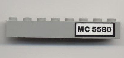 Lego Brick 1 x 8 with Black 'MC 5580' Pattern (Sticker) - Set 5580 / Light Gray