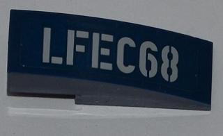 Lego Slope, Curved 3 x 1 with 'LFEC68' Pattern Model Left Side (Sticker) - Set 6867 / Dark Blue