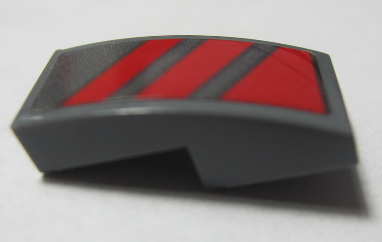 Lego Slope, Curved 2 x 1 x 2/3 with Red Diagonal Stripes Pattern Model Left Side (Sticker) - Set 70613 / Dark Bluish Gray