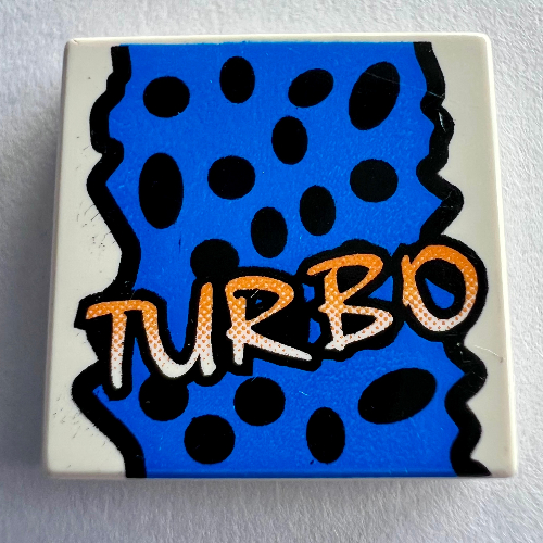 Lego Tile 2 x 2 with Yellow 'TURBO', Black Spots, Blue Background Print / White