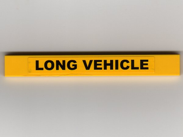 Lego Tile 1 x 8 with 'LONG VEHICLE' Pattern (Sticker) - Set 7900 / Yellow
