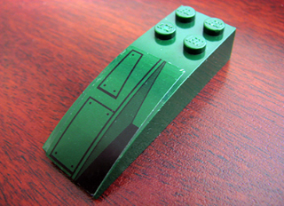 Lego Slope, Curved 6 x 2 with Black Geometric Pattern Model Right Side (Sticker) - Set 7754 / Dark Green
