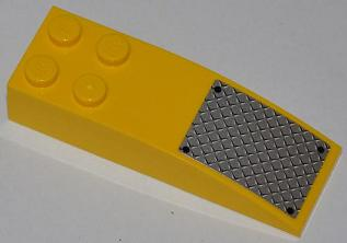 Lego Slope, Curved 6 x 2 with Black Rivets on Silver Tread Plate Small Pattern (Sticker) - Set 7746 / Yellow