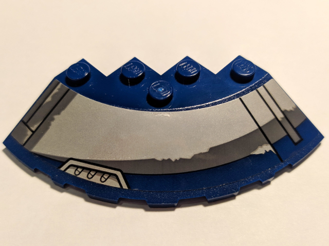 Lego Brick, Round Corner 6 x 6 with Slope 33 Edge, Facet Cutout with Black Lines and Vents Pattern Model Left Side (Sticker) - Set 75199 / Dark Blue