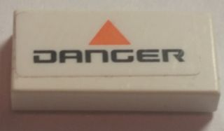Lego Tile 1 x 2 with Orange Up Arrow and 'DANGER' Pattern (Sticker) - Set 7697