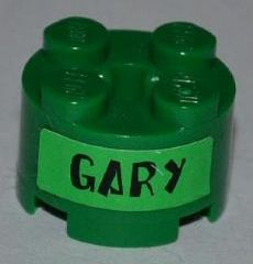 Lego Brick, Round 2 x 2 with Axle Hole with Black 'GARY' on Bright Green Background Pattern on Both Sides (Stickers) - Set 3834