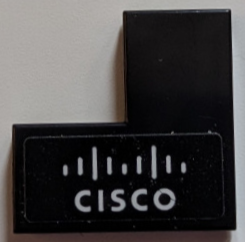 Lego Tile 2 x 2 Corner with White 'CISCO' and Bridge Logo Pattern Model Left Side (Sticker) - Set 76919 / Black