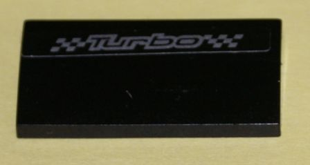 Lego Slope, Curved 2 x 4 x 2/3 with Bottom Tubes with 'Turbo' Pattern (Sticker) - Set 8194 / Black