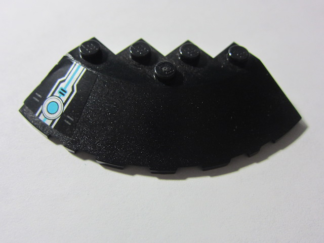 Lego Brick, Round Corner 6 x 6 with Slope 33 Edge, Facet Cutout with Ultrasonic Circle with Silver and Medium Azure Pattern Model Left Side (Sticker) - Set 70171 / Black
