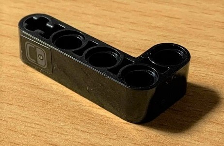 Lego Technic, Liftarm, Modified Bent Thick L-Shape 2 x 4 with Dark Bluish Gray Door Handle Pattern (Sticker) - Set 42078 / Black