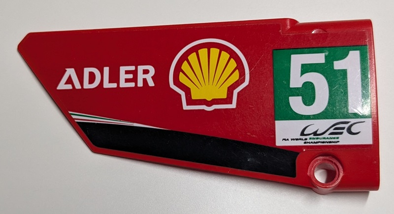Lego Technic, Panel Fairing #17 Large Smooth, Side A with 'ADLER', Shell Logo, 'WEC FIA WORLD ENDURANCE CHAMPIONSHIP' and White '51' in Green Rectangle Pattern (Sticker) - Set 42125