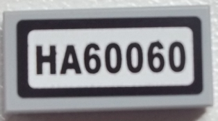 Lego Tile 1 x 2 with 'HA60060' Pattern (Sticker) - Set 60060 / Light Bluish Gray