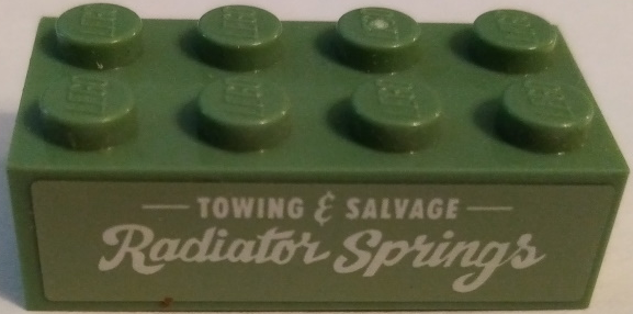 Lego Brick 2 x 4 with 'TOWING & SALVAGE' and 'Radiator Springs' Pattern (Sticker) - Set 8677 / Sand Green