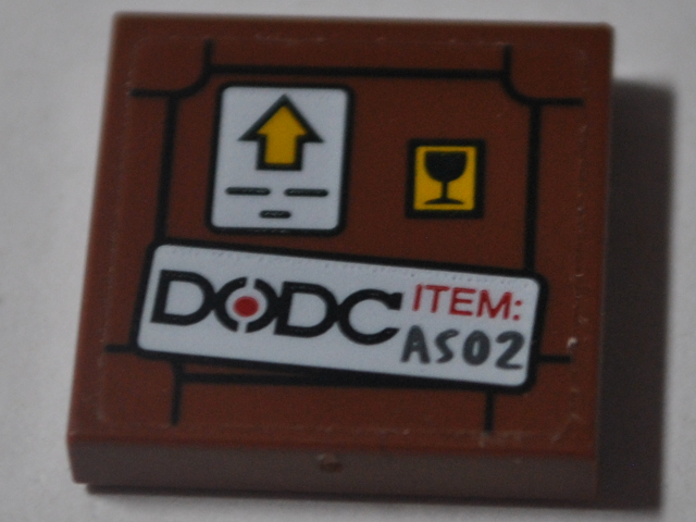 Lego Tile 2 x 2 with Warning Sign, 'DODC' and 'ITEM: A502' on White Background Pattern (Sticker) - Set 76083 / Reddish Brown