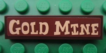 Lego Tile 1 x 4 with 'GOLD MINE' Pattern (Sticker) - Set 7594 / Dark Brown