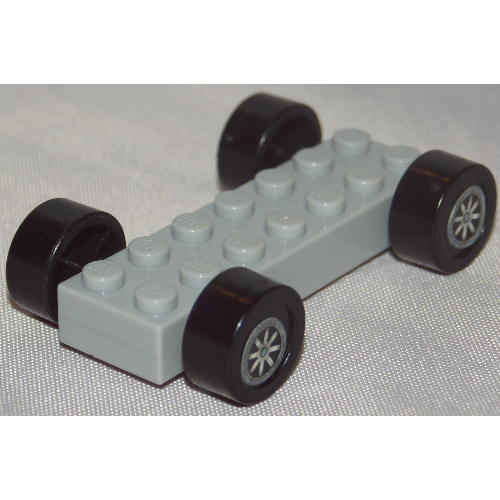 Lego Vehicle Base Fast Food Racer 2 x 7 x 2/3 with Black Wheels, Slicks / Light Bluish Gray